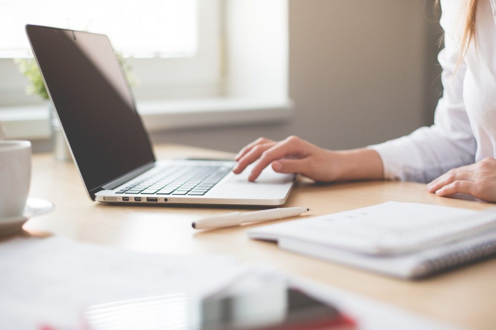 Woman using MacBook