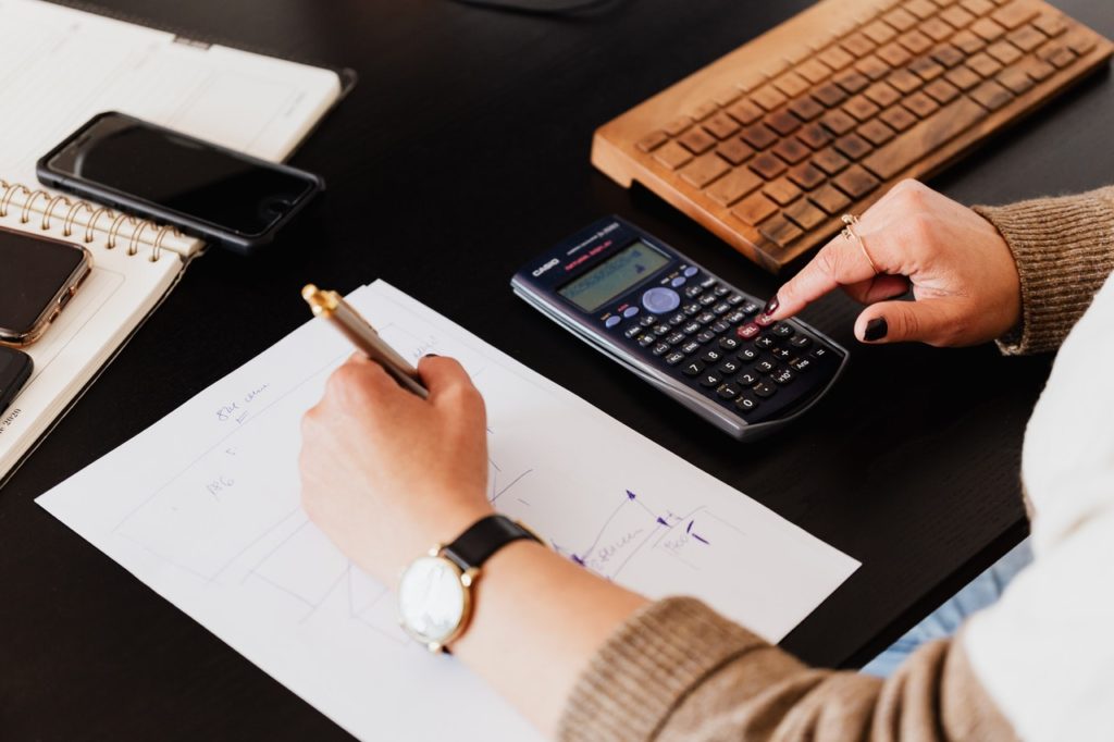 Using calculator and taking notes